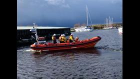 Lough Derg RNLI lifeboat with 4 crew on board departing their station on a shout