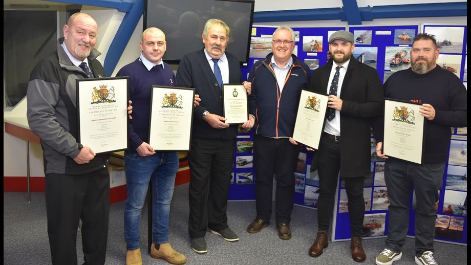 Andrew Smith, James Tacon, Henry Carter, Ben Arlow and Michael Beadle with their framed certificates