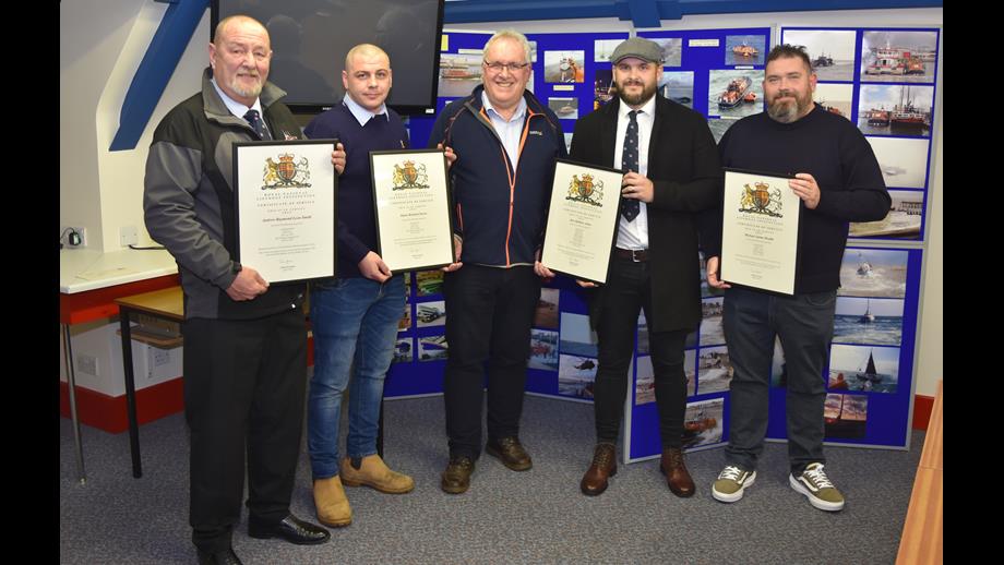 Andrew Smith, James Tacon, Henry Carter, Ben Arlow and Michael Beadle with their framed certificates presented by Richard Musgrove