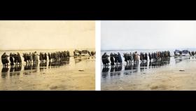 Black and white image on left in comparison to colourised image on the right. Depicting a line of women hauling boat ashore.
