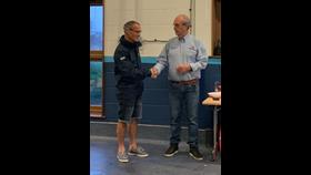 Tony presenting Max with his long service award