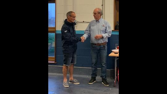Tony presenting Max with his long service award