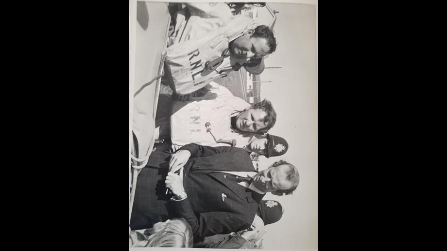 Duke of Kent with a member of lifeboat crew and two police officers in background