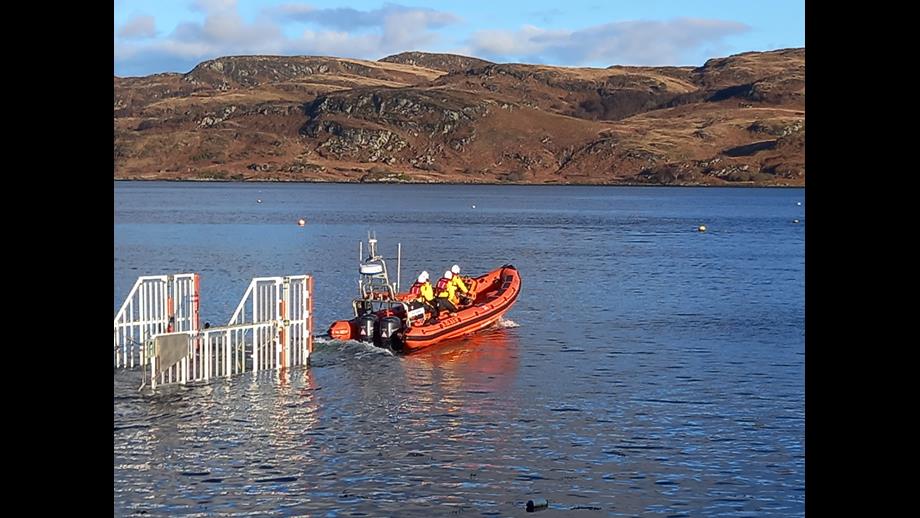 The inshore lifeboat launching from it's trailer into the Kyles of Bute