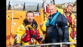 Crew member receiving medal