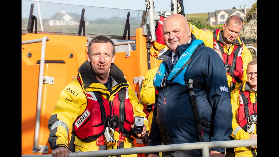 Crew member receiving medal