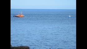 Seahouses Lifeboat towing the casualty vessel