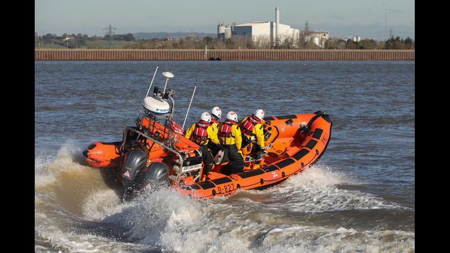 Gravesend RNLI's Atlantic 85 Lifeboat in the River Thames moving at Speed