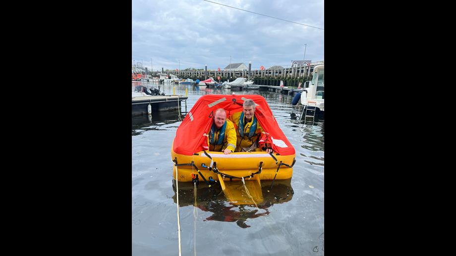 Treasurer/Crew John Tait and Deputy Coxwain Alan Jeans as the 1st to enter the raft