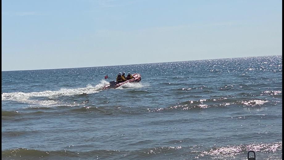Port Talbot RNLI launching to a partially deflated dinghy