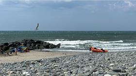 Borth Beach with Coastguard crew and beached lifeboat 