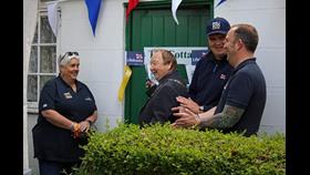Mayor Ian Blackburn cuts the golden ribbon to signify the opening of 'The Cottage'