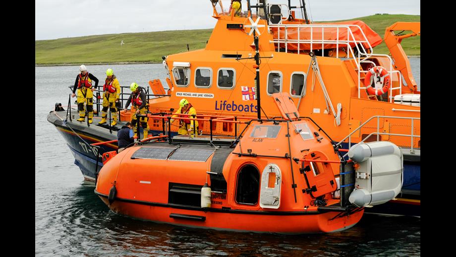The former offshore lifeboat alongside Lerwick Lifeboat, by the quayside in Lerwick Harbour.&quot;