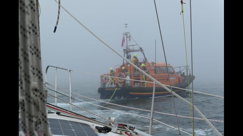 Eyemouth lifeboat 'Helen hastings' tows yacht 'Flamingo' after engine failure. The weather is heavy fog with a moderate swell.