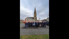 Lifeboat and volunteers outside of church