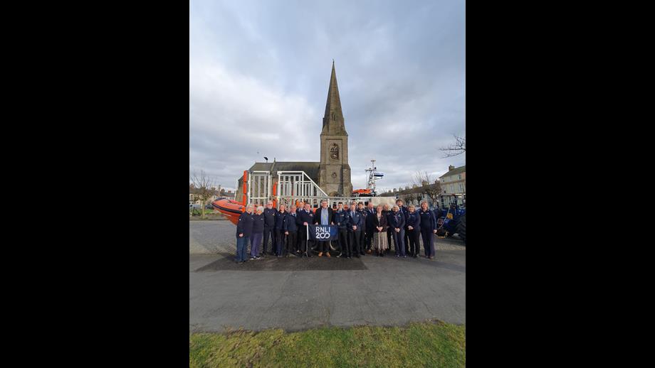 Lifeboat and volunteers outside of church