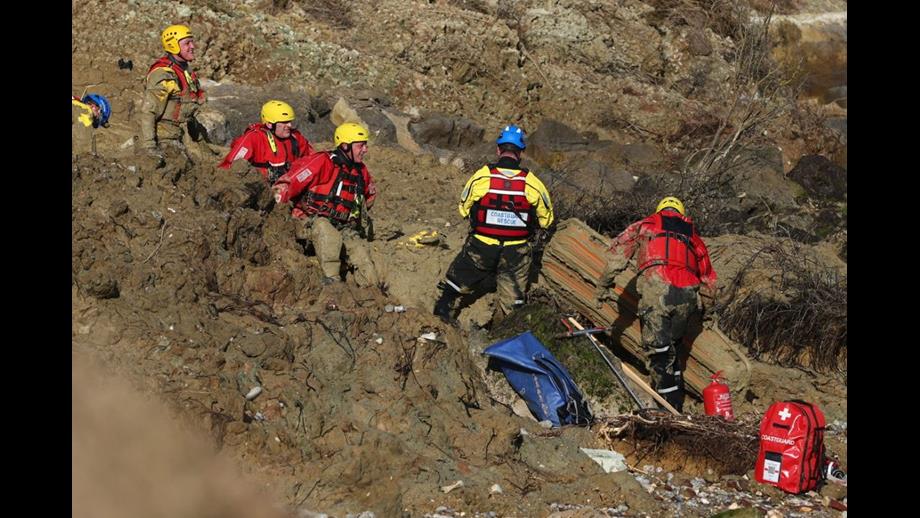 Coastguard and Fire Service teams at the site of the incident