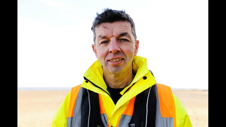 Portrait of man in yellow jacket