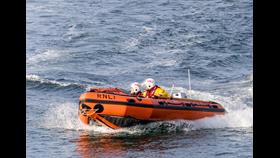 An open water shot of the D Class lifeboat returning to Craster Harbour 