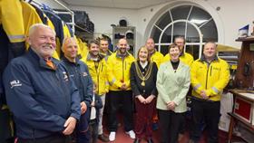 Plymouth Lord Mayor with Plymouth RNLI Crew receiving King's Coronation Medal