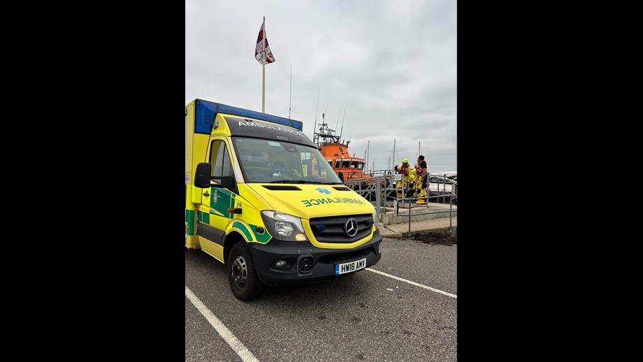 IOW ambulance service meeting Yarmouth RNLI at their berth in Yarmouth Harbour