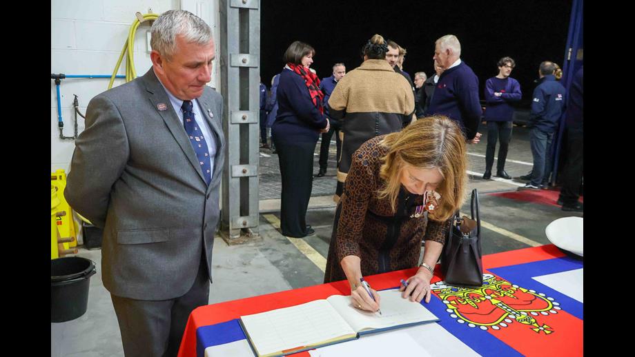 The Lady Colgrain, Lord-Lieutenant of Kent signs the station's visitor book (RNLI Margate)