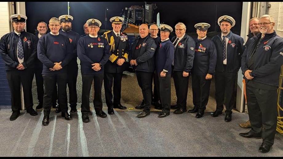 A group of RNLI volunteers with Lord Warden Admiral Sir George Zambellas and The Right Worshipful the Mayor of New Romney CllrJohn Rivers after receiving their King's Coronation Medals