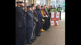 The lifeboat party await the train at Cardiff Central Station.