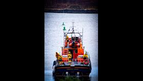 Tobermory lifeboat after towing casualty vessel to pontoons
