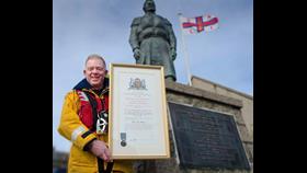 John May with his grandfather’s medal and testimonial on vellum