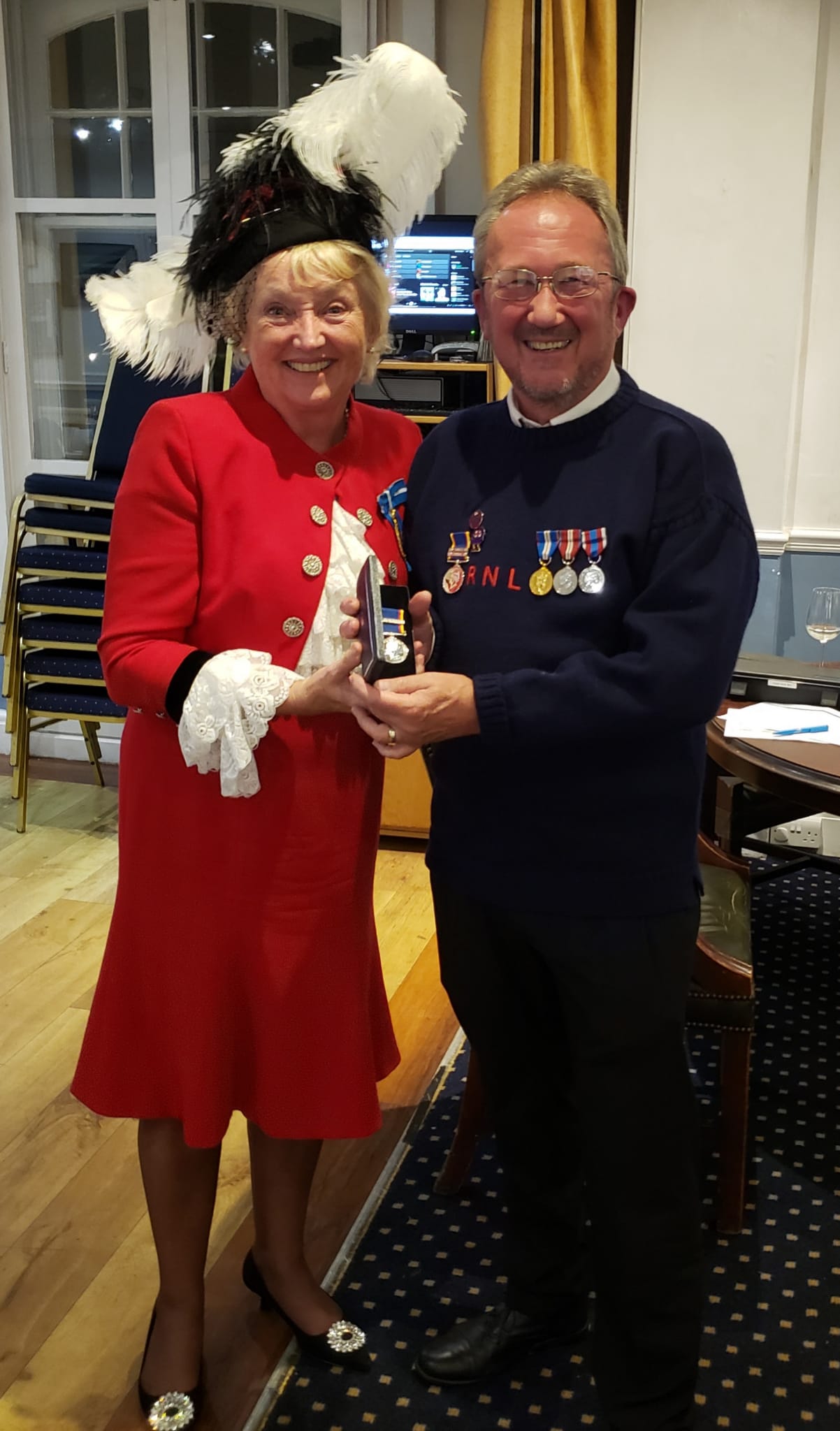 Janey Howell High Sheriff presenting 50 year service medal to Jim Lock