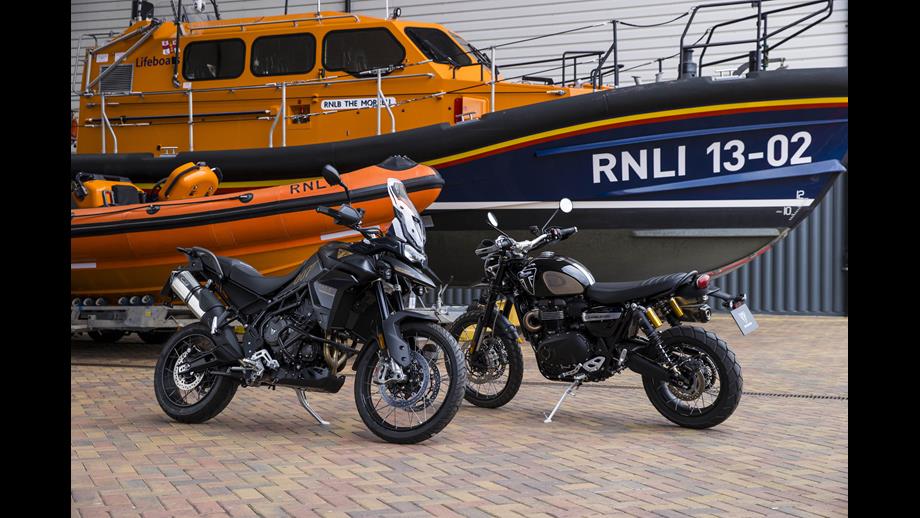 Daniel Craig's motorbikes in front of a Shannon class lifeboat and an Atlantic 85 lifeboat