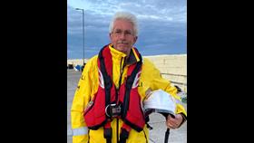 Portrait of Mike in his crew kit