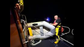The small dinghy plus its two occupants safely onboard the Sheerness RNLI lifeboat