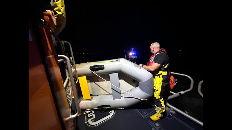 The small dinghy plus its two occupants safely onboard the Sheerness RNLI lifeboat