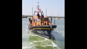 The Sheerness Shannon class lifeboat in shallow water.