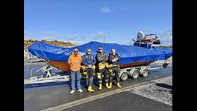 Arran RNLI volunteers collect Rachel Hedderwick after four month refit