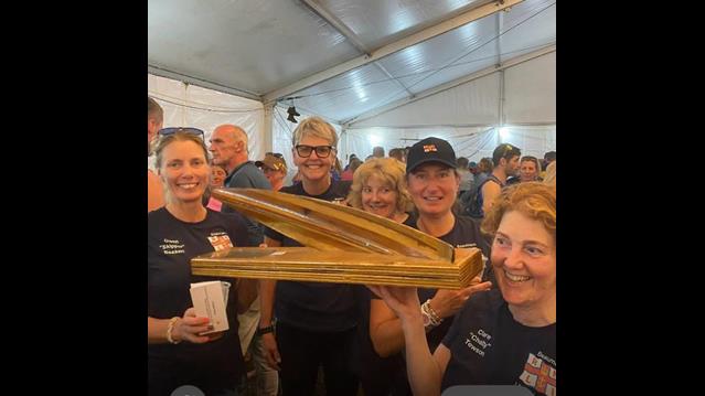 The team holding their Tamar Trophy