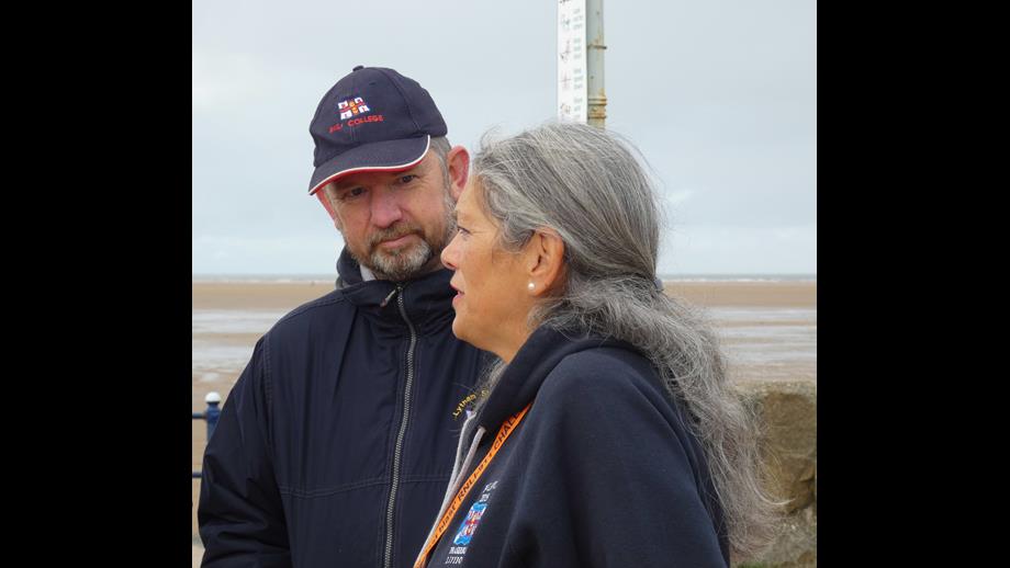 A man and a woman chat