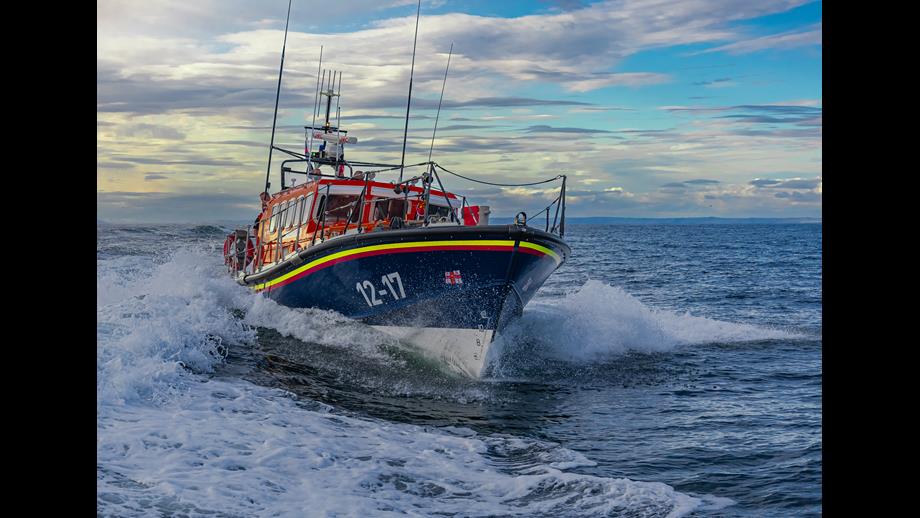 RNLI lifeboat on water.