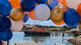 Yarmouth Severn class lifeboat Eric and Susan Hiscock (Wanderer) 17-25 decorated for the occasion outside the Yarmouth Sailing Club.