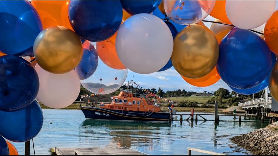 Yarmouth Severn class lifeboat Eric and Susan Hiscock (Wanderer) 17-25 decorated for the occasion outside the Yarmouth Sailing Club.