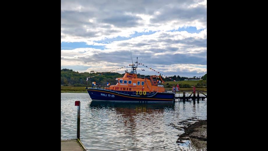 Yarmouth Severn class lifeboat Eric and Susan Hiscock (Wanderer) 17-25 decorated for the occasion outside the Yarmouth Sailing Club.