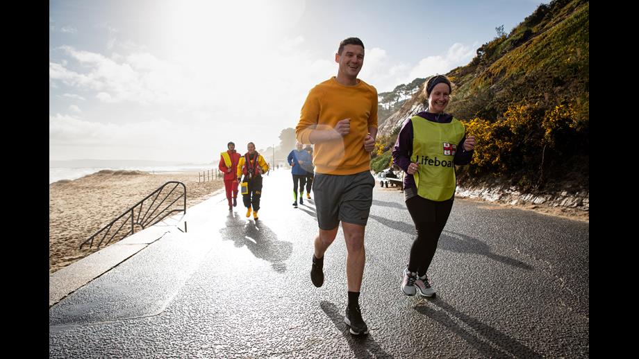 People jogging along sea front in Mayday Mile event 