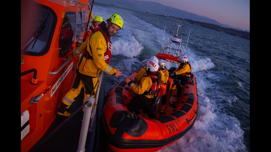 Crew on the desk ofthe Rhyl Shannon class lifeboat Anthony Kenneth Heard 13-34 during a training exercise with Beaumaris RNLI.