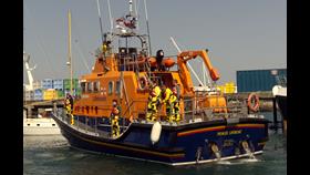 Shows Penlee Lifeboat docking
