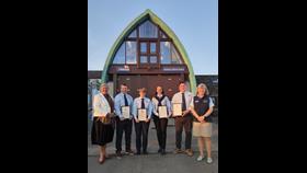 Portaferry RNLI crew receive awards for saving the lives of two sailors (L-R) Anna Classon -RNLI Head of Region, Portaferry Helm Chris Adair, Molly Crowe, Ros Wetret, Portaferry Helm Scott Blackwood and Heather Kennedy - Portaferry RNLI Lifeboat Operations Manager