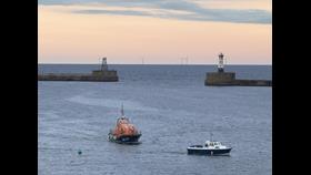 Peterhead RNLI assisting the casualty vessel to Peterhead marina. 