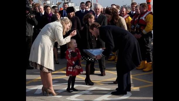 Katie-Jayne and her mum Sarah-Jayne meeting The Prince and Princess of Wales in 2011 during their visit to Trearddur Bay Lifeboat Station