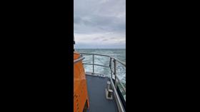 Newhaven lifeboat towing the casualty yacht